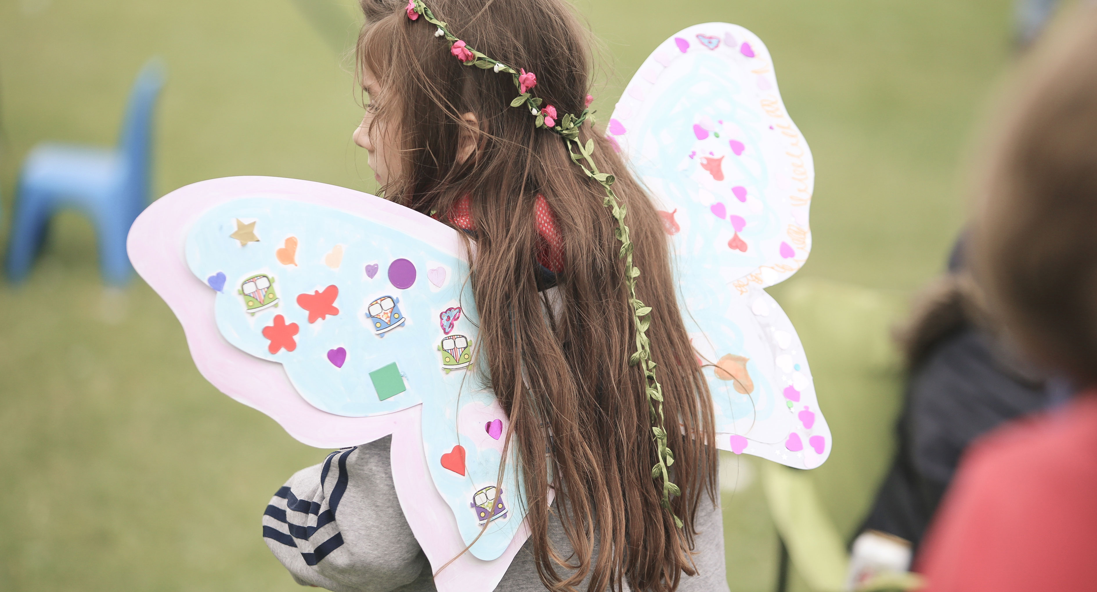 Child dressed up at family-friendly festival